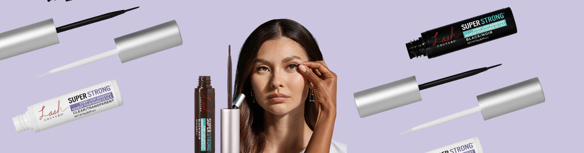Woman applying false eyelashes with Lash Couture Super Strong strip lash adhesive against a light purple background with adhesive tubes and applicators.