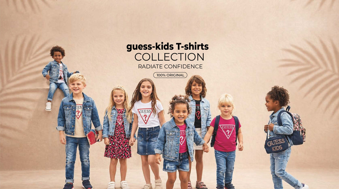 Group of children in casual denim outfits with Guess Kids branding, standing against a gray background