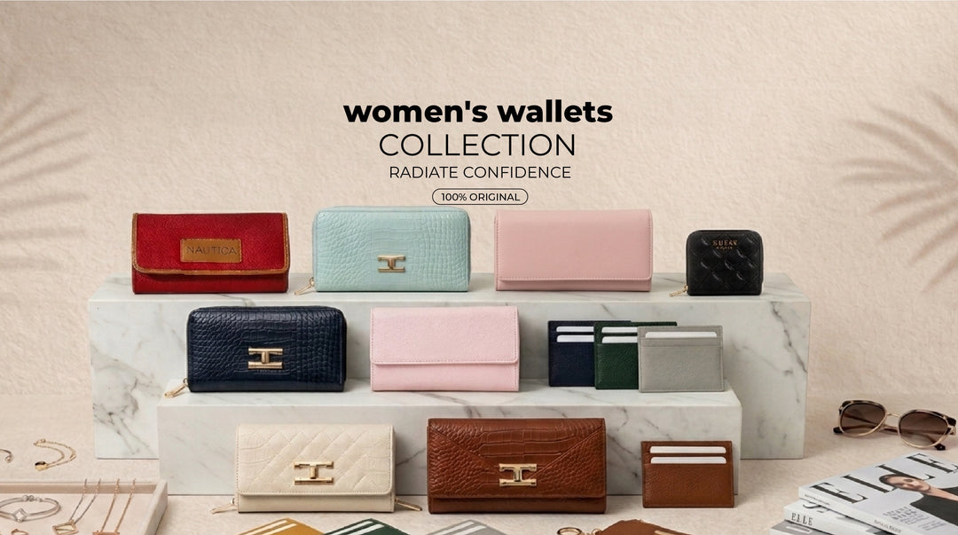 Elegant women’s wallets and card holders in various colors displayed on marble table, luxury accessories