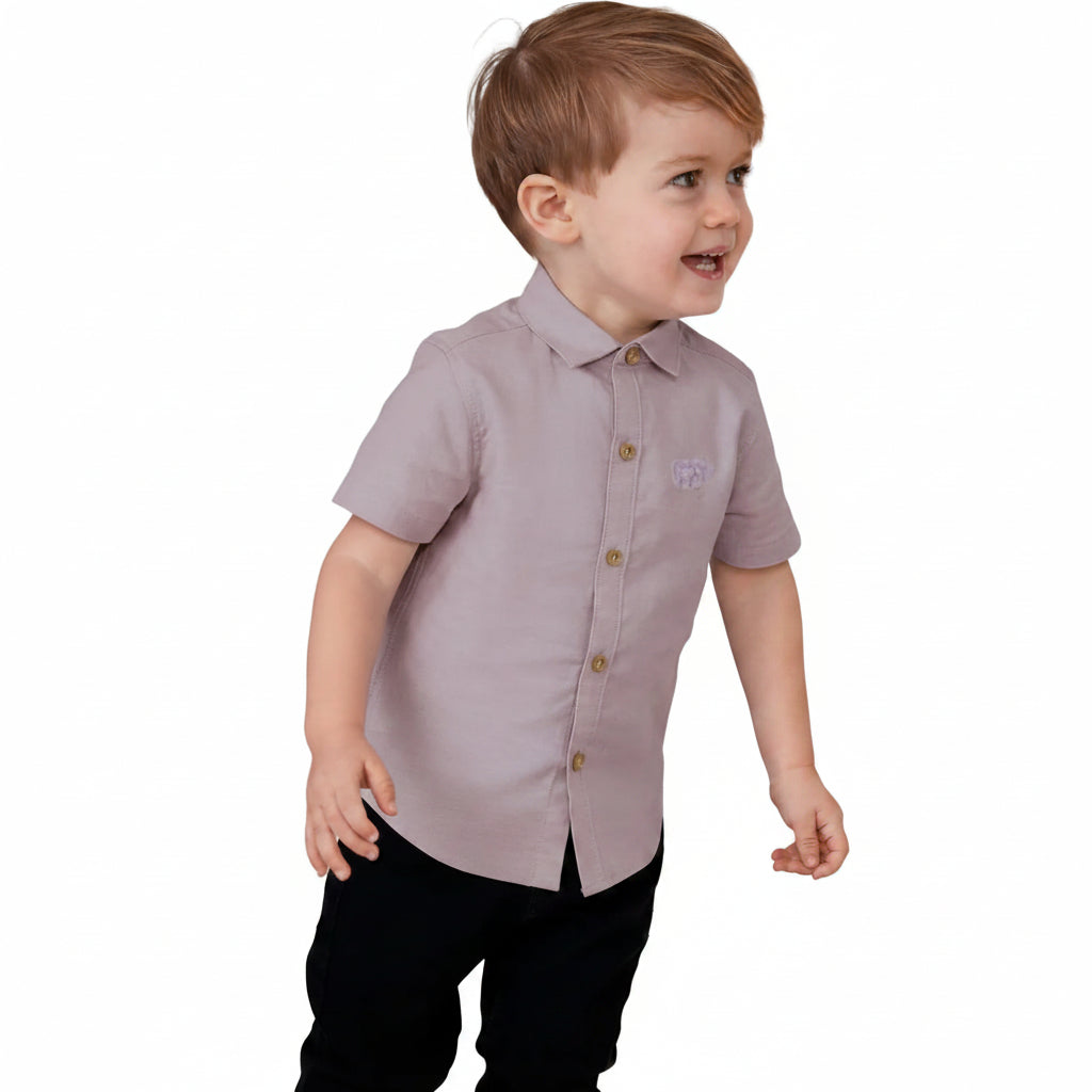 Child wearing a light purple button-up shirt on a white background