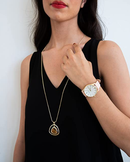 Nine West Women's NW/1994WTPK Gold-Tone and Pastel Pink Strap Watch - 3alababak